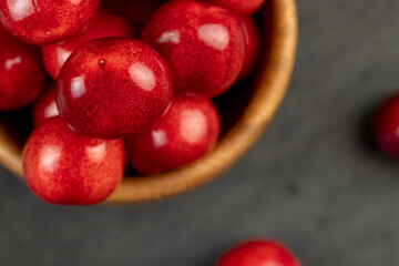 delicious collected and wet cherry berries with pits