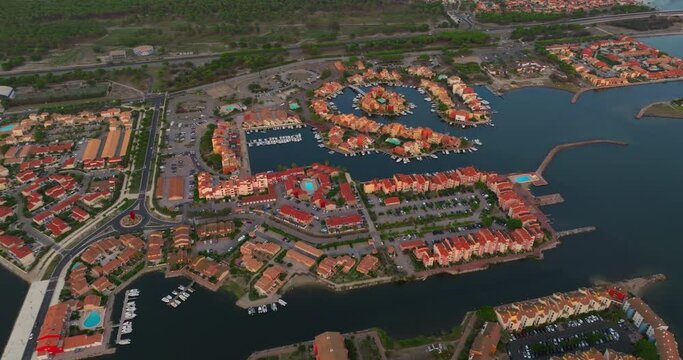 Aerial view of Port Leucate with mediterranean sea in background sunset France, Aude, Occitanie