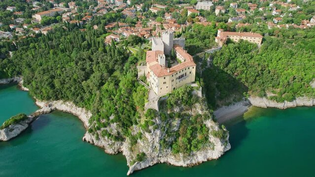 Old Castle of Duino on the high cliff over Mediterranean sea Trieste bay, Italy.