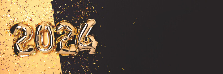 Banner with 2024 air balloons and glowing stars confetti on a black and gold background. New Year...