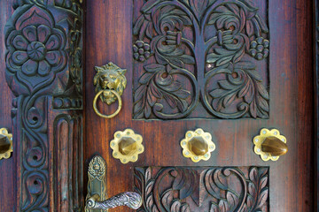 traditional cultural swahili door decoration and detail of arabic and indian origin found in...