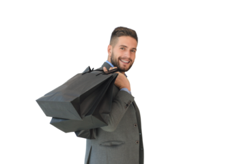 Handsome man in suit with shopping bags on a transparent background