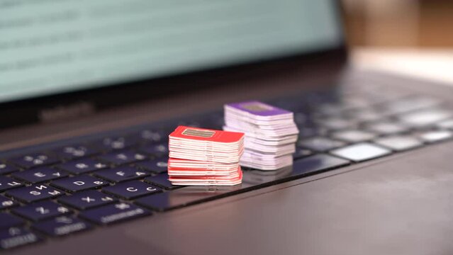 Many SIM cards on a laptop keyboard. Bot farm. Mobile gsm cards