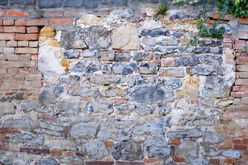 Oxford Old Stone Wall, rough sandy texture of old medieval stone wall, atmosphere of antiquity and university style Background for design, copy space