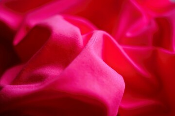 Closeup wrinkled pink jersey, soft fabric background - obrazy, fototapety, plakaty