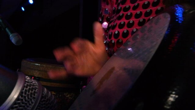 playing hard drum, darbuka at a wedding