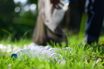 Workers collect plastic bottle trash