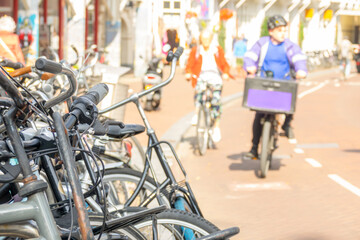 Cyclists on a Sunny Amsterdam Street