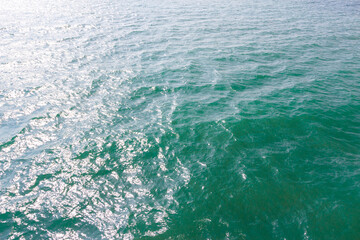 Blue sea surface with waves