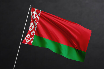 3D Waving flag design. Belarus National flag on black background.
