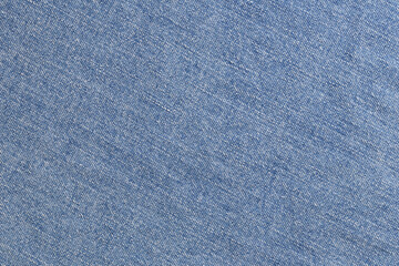 Naklejka premium Texture of blue jeans as background, closeup