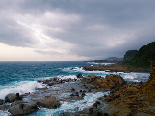 Fototapeta na wymiar The coastal area of the island at the Heping Island GeoPark in Keelung, Taiwan.