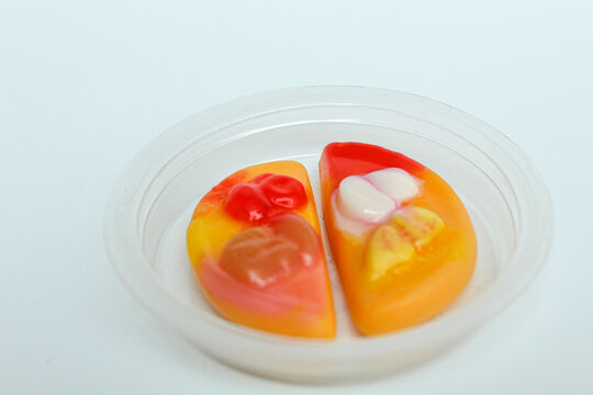 Gummy candy in pizza form. Isolated on white background