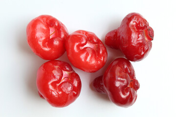 Small and red colored fruit of Syzygium aqueum. Also known as water cherry, watery rose apple,...