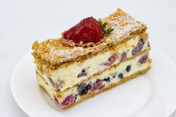 Berry Filled Napoleon Pastry on a White Plate