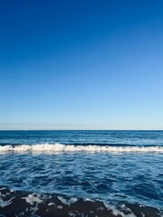 Fototapeta premium Blue sea horizon, natural blue seascape background, ocean bay, clear sky
