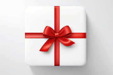 isolated white gift box with red ribbon from above