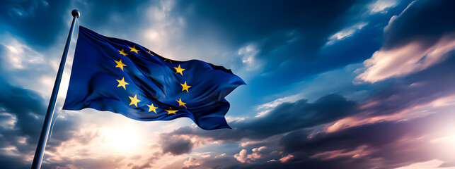 The flag of the European Union fluttering in the wind. - obrazy, fototapety, plakaty