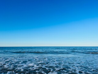 Blue sea horizon, natural blue seascape background, ocean bay, clear sky