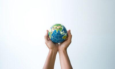human hands holding earth globe.Earth day concept.