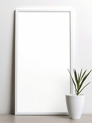 Fresh Minimalism: White Background with Green Plants and Blank Picture Frame Design Template