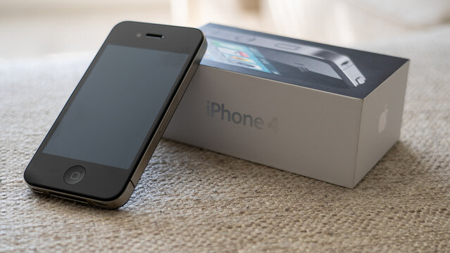 Comparing side by side, the iPhone 4 and the iPhone 14, old versus new.