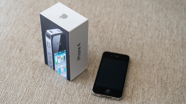 Comparing side by side, the iPhone 4 and the iPhone 14, old versus new.