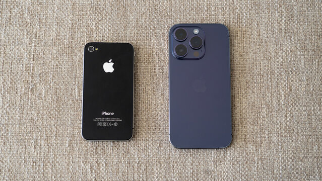 Comparing side by side, the iPhone 4 and the iPhone 14, old versus new.