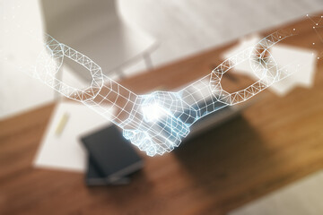 Creative abstract block chain technology hologram with handshake and modern desktop with pc on background, cryptography and decentralization concept. Multi exposure