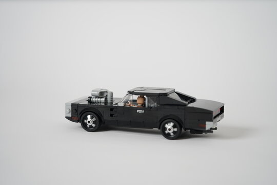 Fast & Furious 1970 Dodge Charger R/T.Lego classic black car built on white background. 