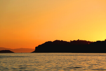 Beautiful sunset on the beach in Vela Luka, island Korcula, Croatia.