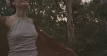 Young woman dancing in the nature