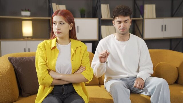 Man apologizing to his wife.