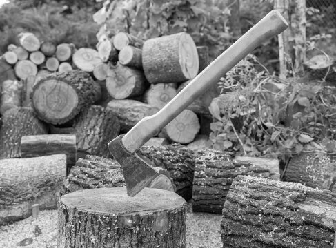 Photography on theme big steel axe with wooden handle