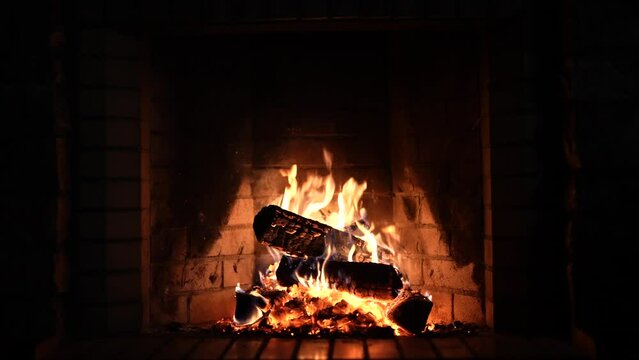 Fireplace. Cozy Relaxing Fireplace. Firewood. Flames of a country house. Warmth and home comfort. Hearth. fire is burning in the fireplace. beautiful fire in the fireplace, Wood burning 