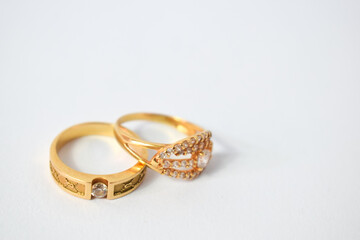 Close Up Golden ring with diamond on isolated white background