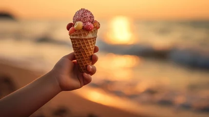 Foto auf Alu-Dibond Ice cream in waffle cone in child hand on sunset background. Various of Ice Cream Flavor. Summer and Sweet Menu Concept.. Background with a copy space. © John Martin