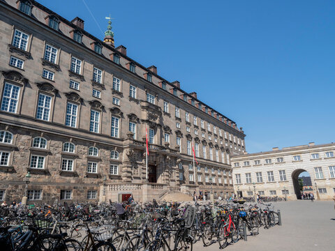 Rows of bicycles outside the Christiansborgs Palace, home of the Danish Parliament, Copenhagen, Denmark