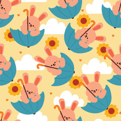 seamless pattern cartoon bunny playing with umbrella. cute animal wallpaper with sky element, umbrella