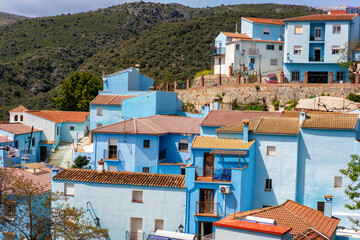 Street in blue painted Smurf house village of Juzcar, Pueblos Blancos region, Andalusia, Spain