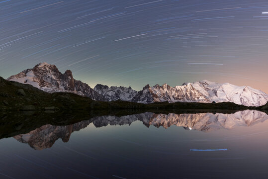 Star trail over Mont Blanc range seen from Lac de Cheserys, Chamonix, French Alps, Haute Savoie, France