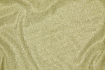 Trendy 80s, 90s, 2000s Background of draped light green fabric with silver lurex thread. Beautiful...
