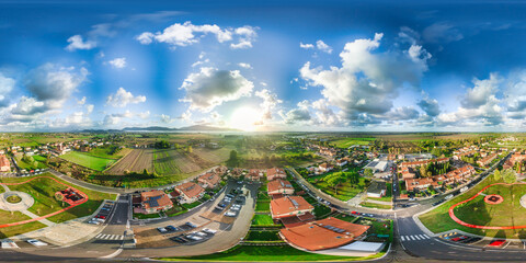 Aerial view of a modern city village in the countryside. Full spherical seamless panorama 360...