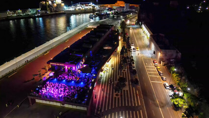 Madeira, Portugal - September 2, 2022: Aerial view of CR7 Disco with people dancing at night