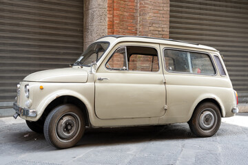 a classic 1960s Italian Fiat 500 Giardiniera three door estate car - obrazy, fototapety, plakaty