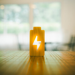 Technology battery high power electric energy with a connected charging cable. Battery to electric...