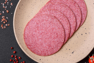 Delicious smoked salami sausage with salt, spices and herbs