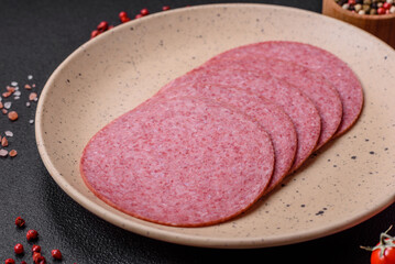 Delicious smoked salami sausage with salt, spices and herbs