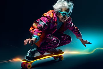 Tuinposter Cool elderly woman dressed in casual riding skateboard © Oksana