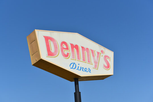 LONG BEACH, CALIFORNIA - 18 OCT 2023: Retro sign at the Dennys Diner on Pacific Coast Highway, PCH.